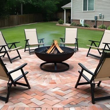 Image of a wood burning fire pit on a brick patio for a blog post about fire pit placement.