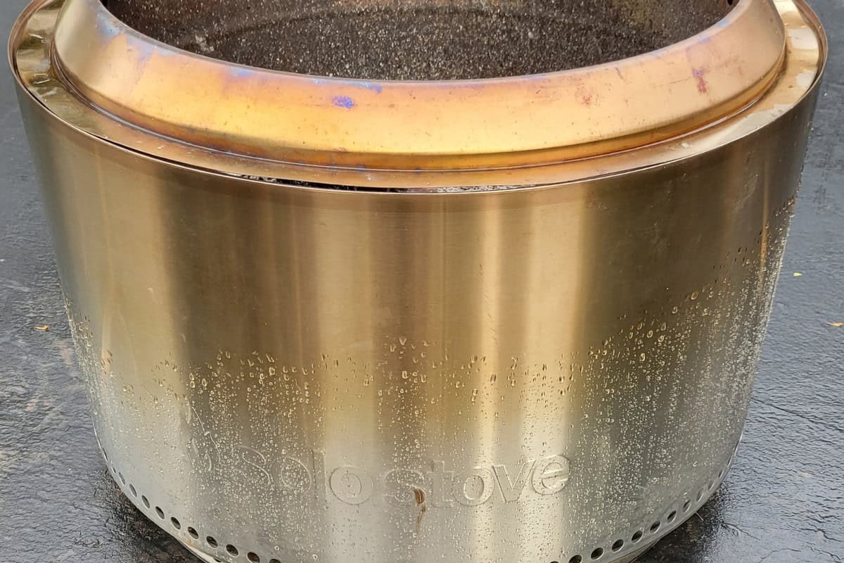 Image of a Solo Stove fire pit out in the rain for a blog post explaining what to do if your Solo Stove got rained on. 
