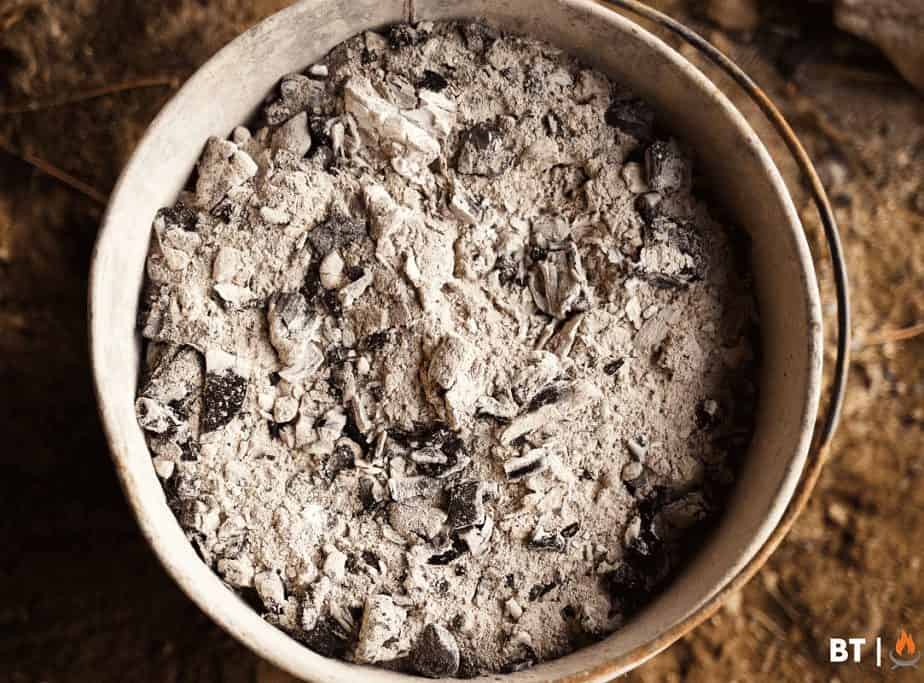 Image of a fire pit ash bucket from above