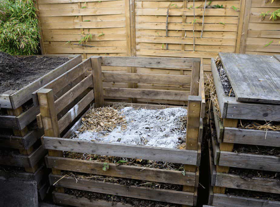 Image a compost heap with fire pit ash spread on top