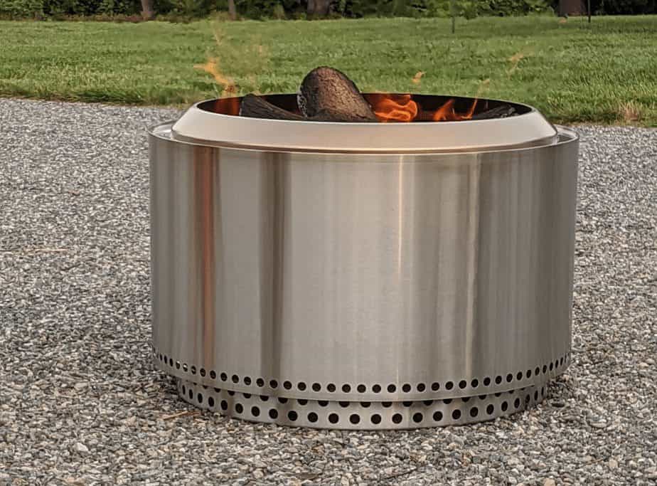 Image of a smokeless fire pit with too much firewood