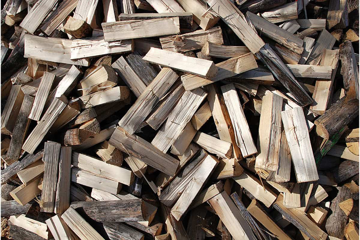 Image of a diverse stack of chopped firewood.