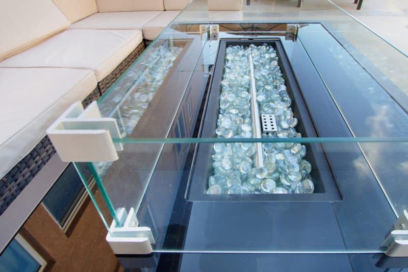 Image of a rectangular gas fire pit for a blog post asking the question "how long does fire pit glass last?"