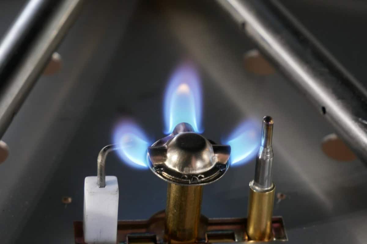 Image of a gas fire pit's ignition system for a blog post answering the question "how do gas fire pits work?"