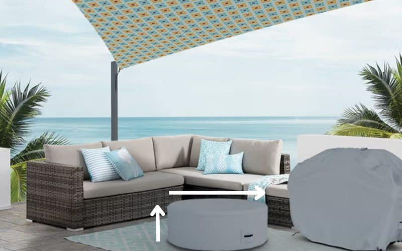 Image of a fire pit and furniture in a coastal scene for a blog post covering how to measure for a fire pit cover.