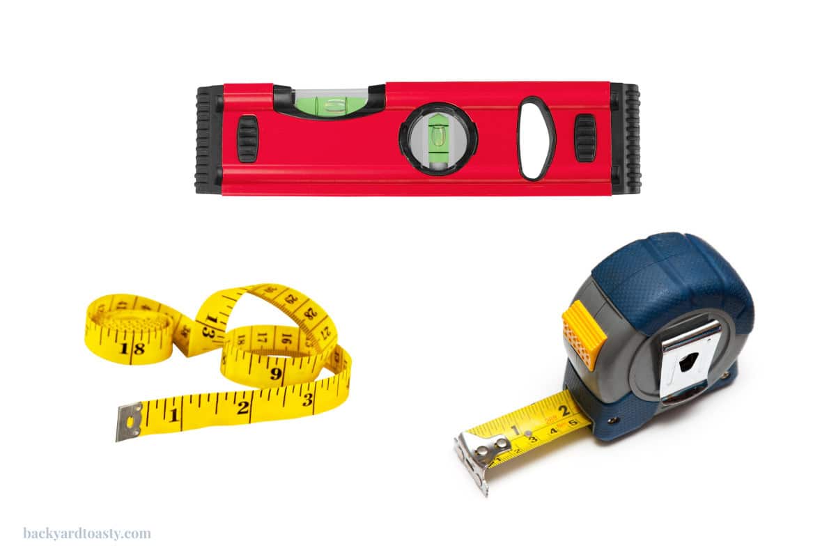 Image of the three measuring tools you'll need, a level, and measuring tapes.