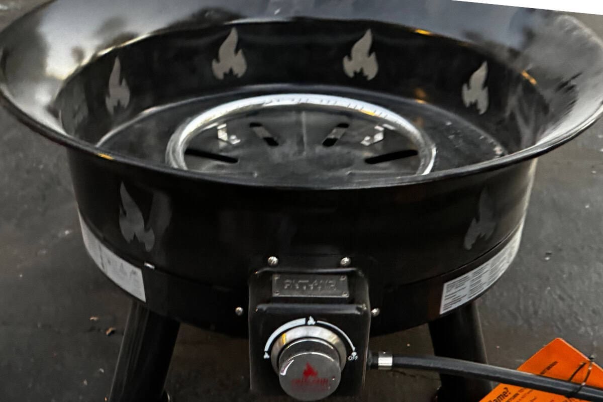 outland-living-mega-fire-pit-review-design Image of a new portable gas fire pit just out of the box.