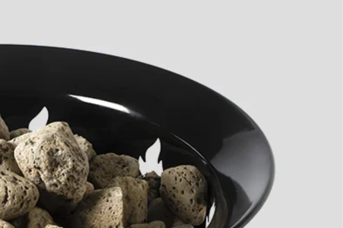 outland-living-mega-fire-pit-review-weather Image of the powder coating on the rim of a gas fire pit for a blog post of a Outland Living Mega fire pit review.