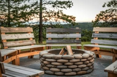 Image of a stone fire pit round and wood benches for an article covering
